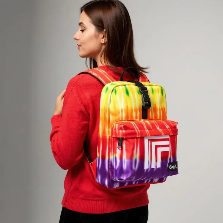 Combine these photos into one fluid scene. Replace the logo on the backpack with the logo submitted as the second image. Then, make the woman in the third image wear the backpack with the new logo.
