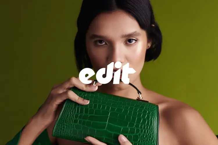 add the word edit in a funky font in the middle center in white text. keep the image exactly the same, do not dim it