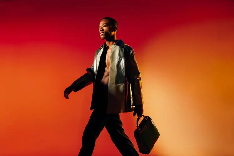 Make him hold the purse